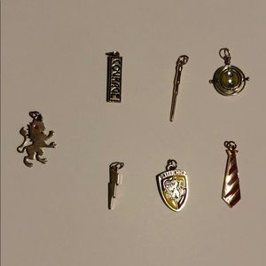 Harry potter necklaces, 2 chains with 7 charms